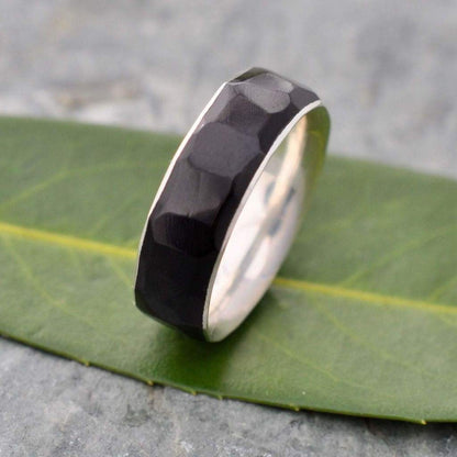 Sterling silver wood wedding band with black coyol and multifaceted texture