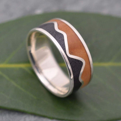 Sustainable sterling silver ring with volcanic sand mountain inlay