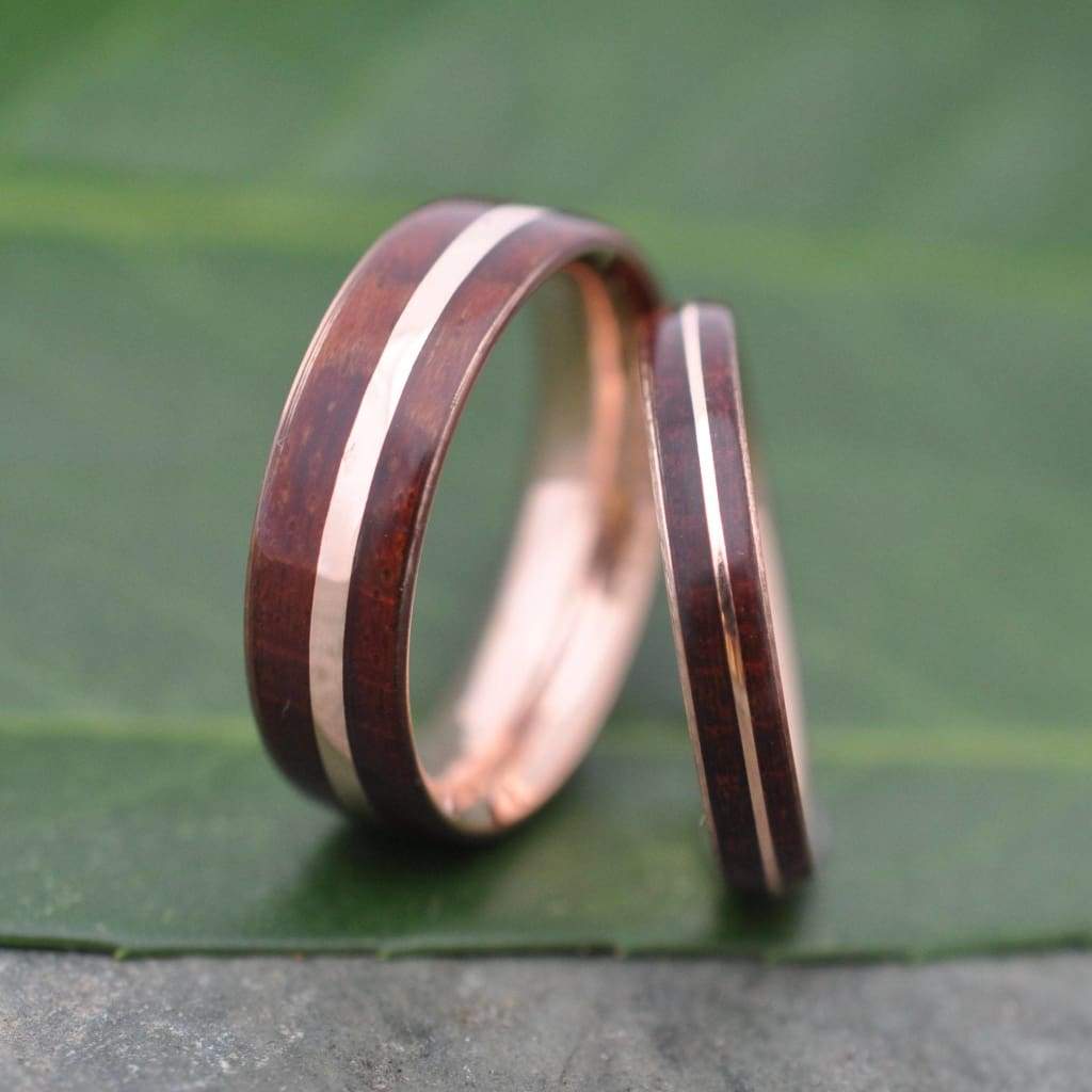 Set of his and hers rose gold wood wedding bands with Guapinol wood