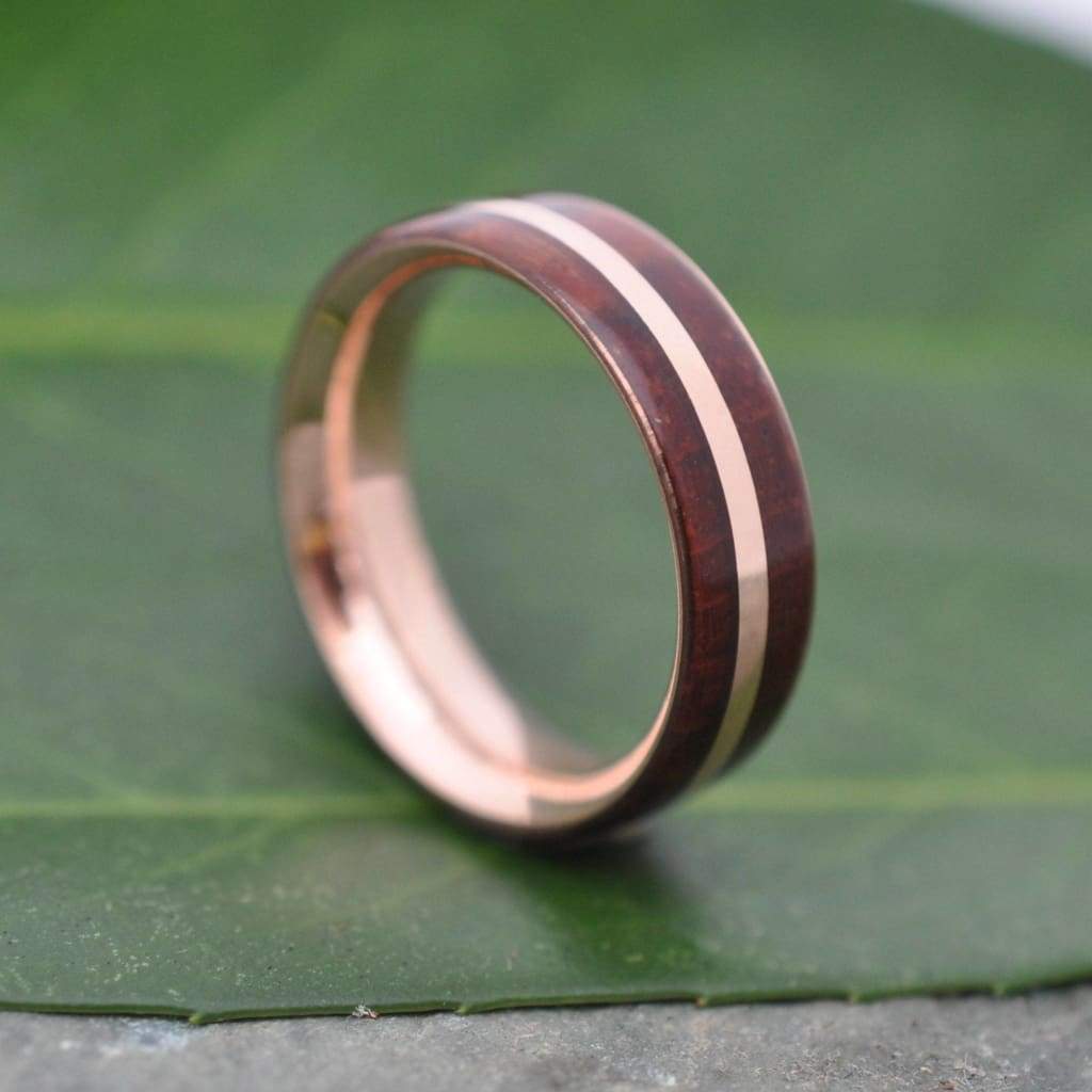 Mens rose gold wood wedding band with natural Guapinol wood grain