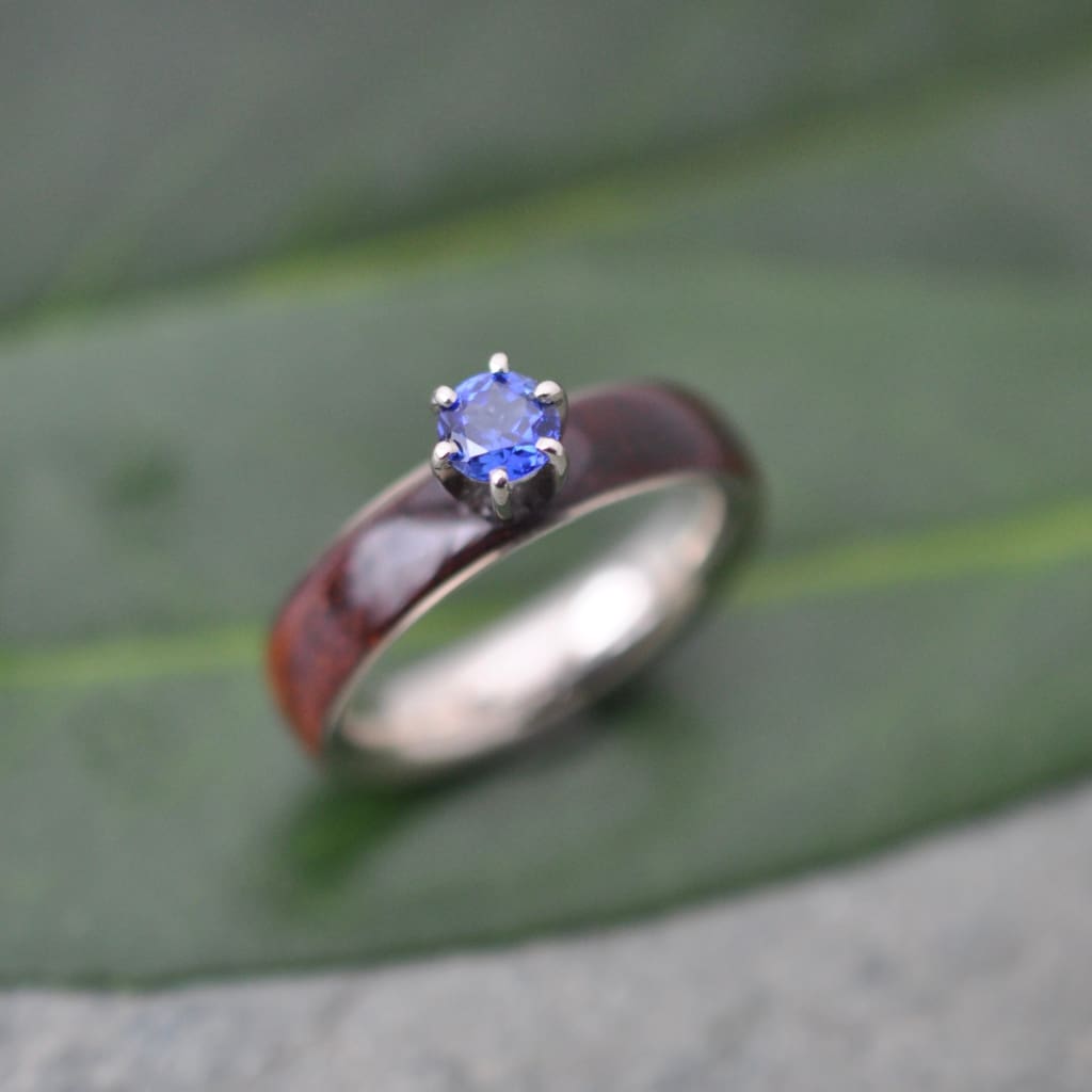 Sapphire and koa wood engagement ring with white gold side profile