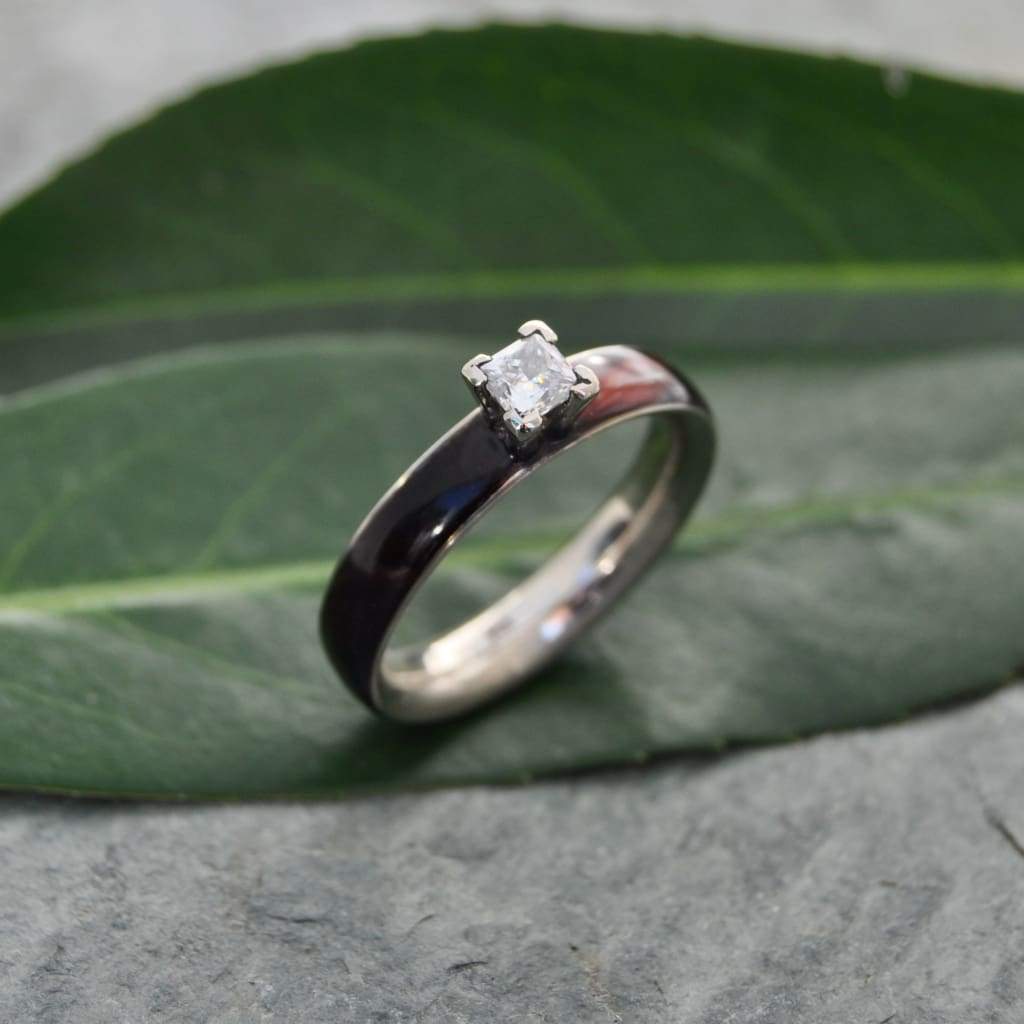 Princess cut diamond wood engagement ring with koa wood and white gold detail view