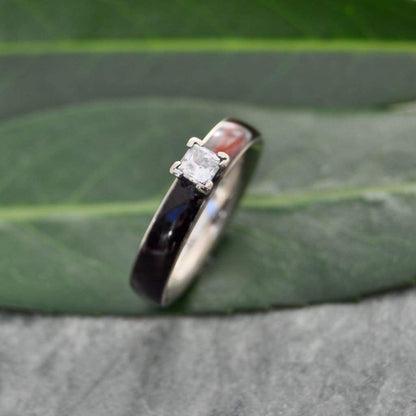 Princess cut diamond wood engagement ring with koa wood and white gold top view