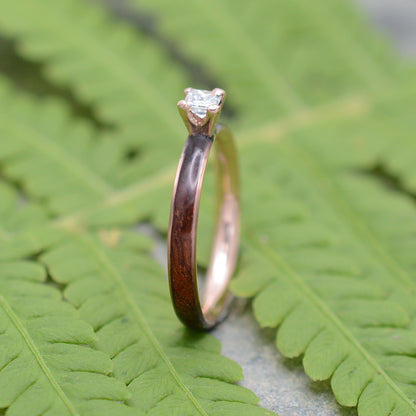 Rose gold diamond wood engagement ring with koa wood and princess cut diamond top view