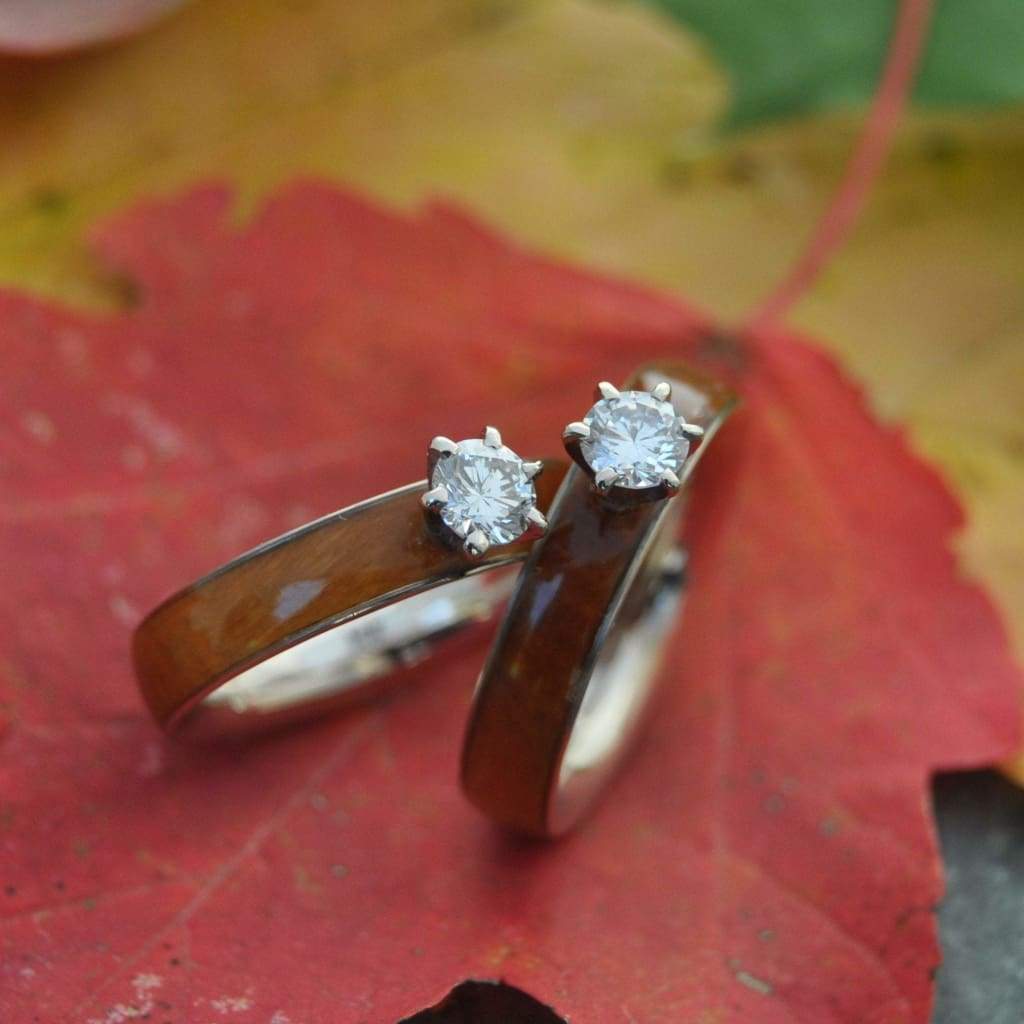 Lignum vitae diamond wood engagement ring in durable Guayacan wood worn on hand