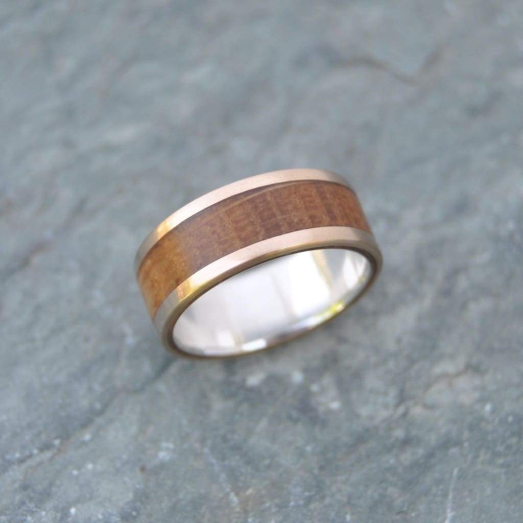 Custom bourbon barrel wedding band with yellow gold and silver, made to order