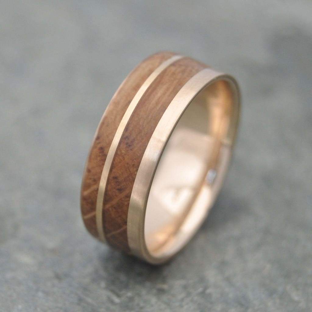 Sustainable mens wedding band with reclaimed bourbon barrel and 14k yellow gold