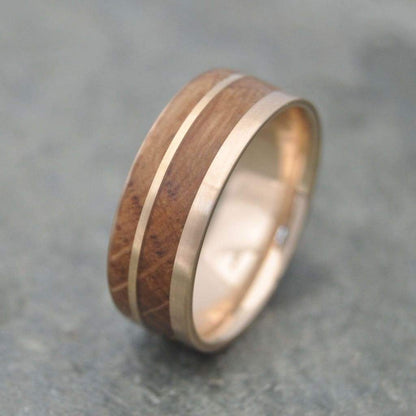 Sustainable mens wedding band with reclaimed bourbon barrel and 14k yellow gold