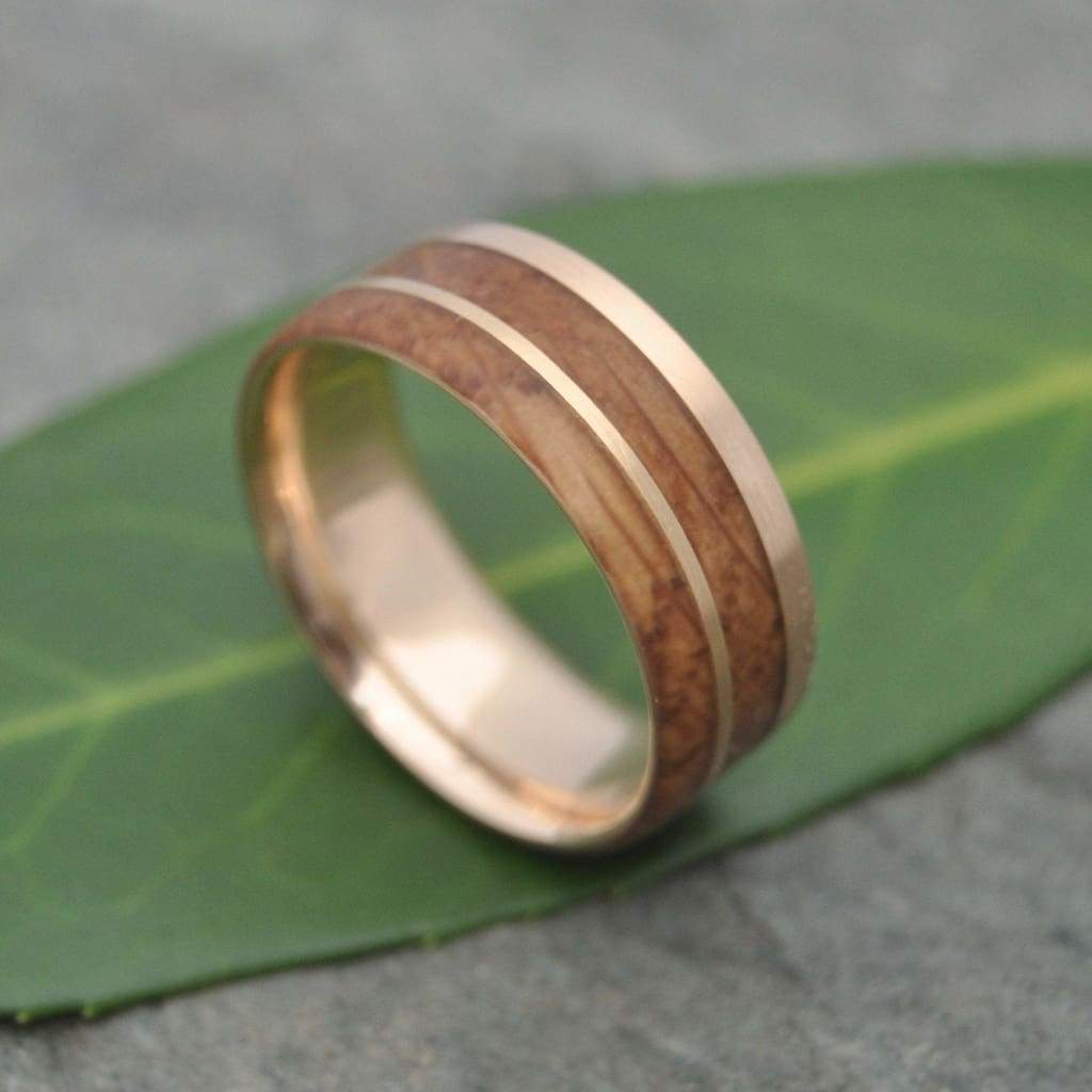 Comfort fit bourbon barrel ring with yellow gold stripe, handmade in Louisville