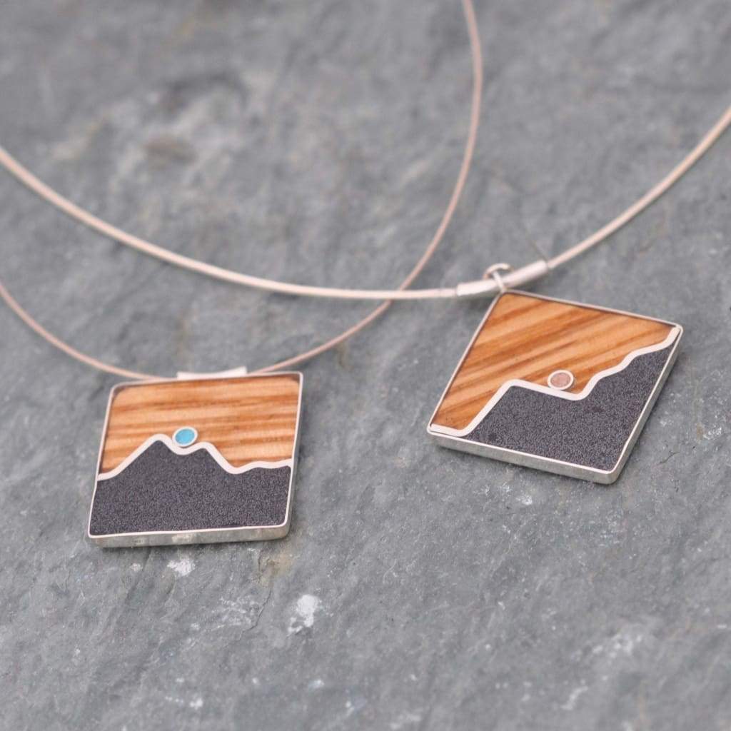 Sustainable mountain pendant with turquoise and reclaimed bourbon wood