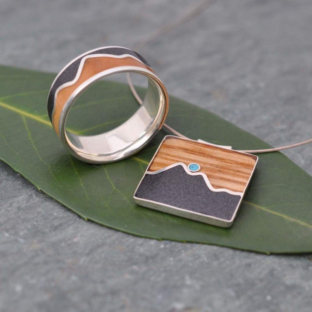 Eco-friendly wood mountain necklace with turquoise and bourbon barrel