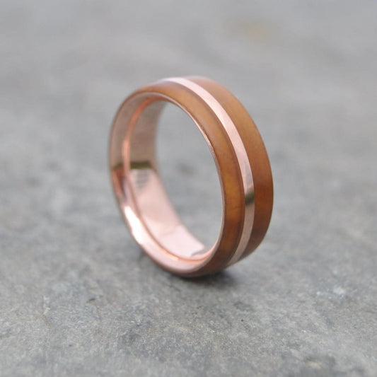 Solsticio Guayacán wood ring with recycled rose gold offset inlay