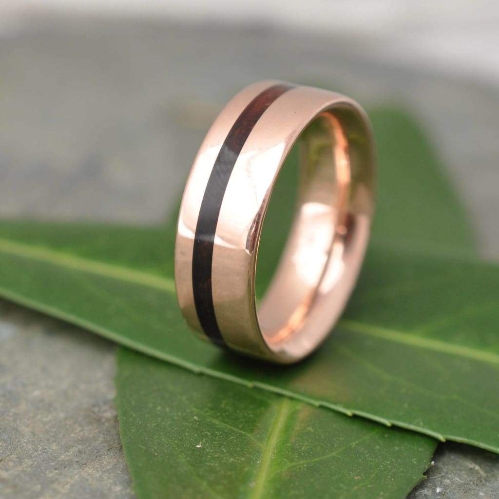 Hawaiian koa wood ring with recycled rose gold inlay, unique grain detail