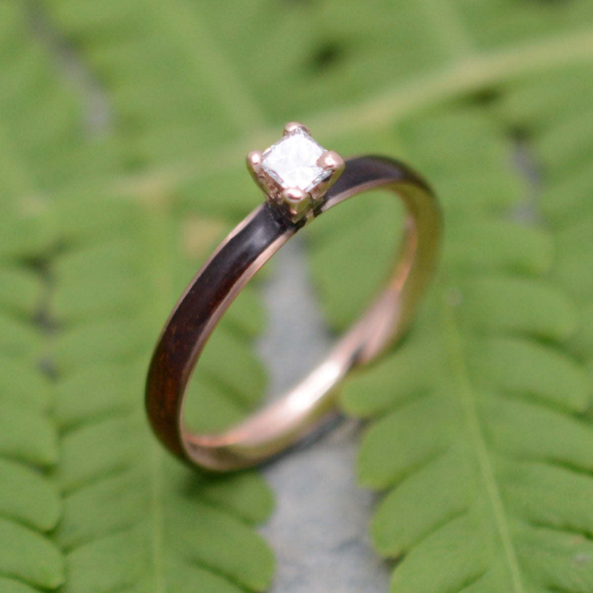 Rose gold diamond wood engagement ring with koa wood and princess cut diamond