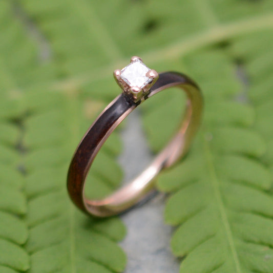 Rose gold diamond wood engagement ring with koa wood and princess cut diamond