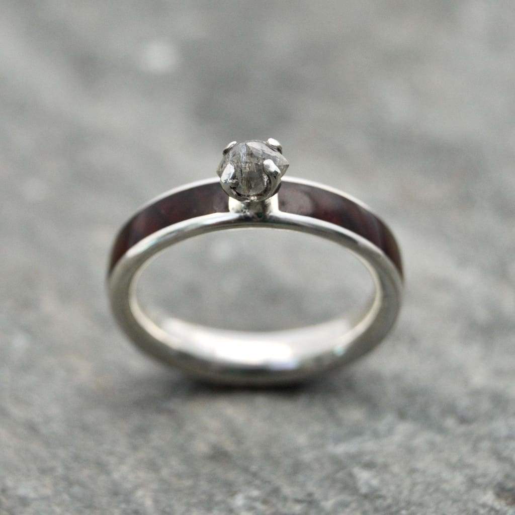 Rough diamond wood engagement ring with cocobolo wood on natural background