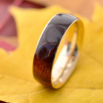 Siempre comfort fit koa wood wedding band with yellow gold