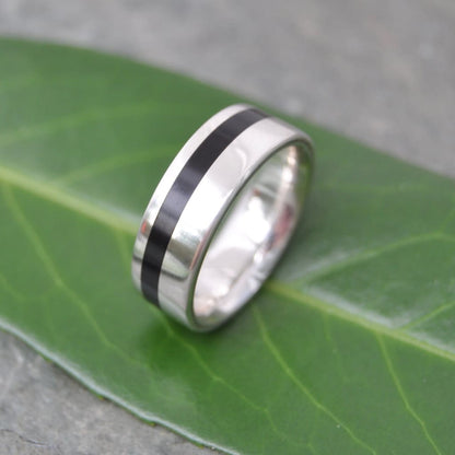 Equinox black coyol wood ring with recycled sterling silver edges
