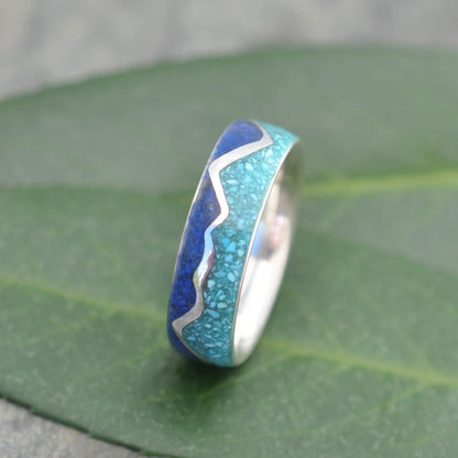 Turquoise ring on leaf showing lapis and turquoise mountain inlay