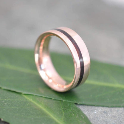 Equinox koa wood wedding ring with recycled rose gold offset inlay