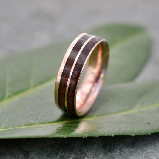 Rose gold wood wedding ring with walnut wood and 14k rose gold, Un Lado Asi design