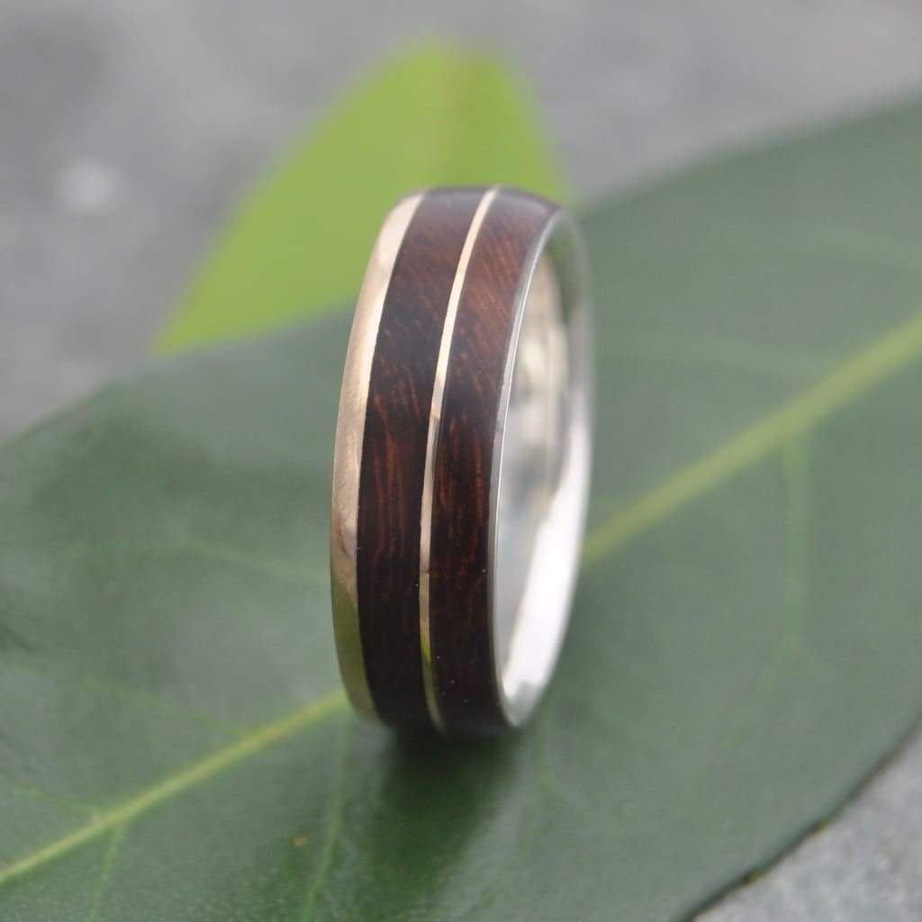Wood ring with gold inlay, nacascolo wood and 14k yellow gold exterior with silver interior