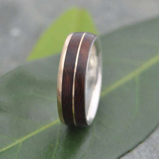 Wood ring with gold inlay, nacascolo wood and 14k yellow gold exterior with silver interior