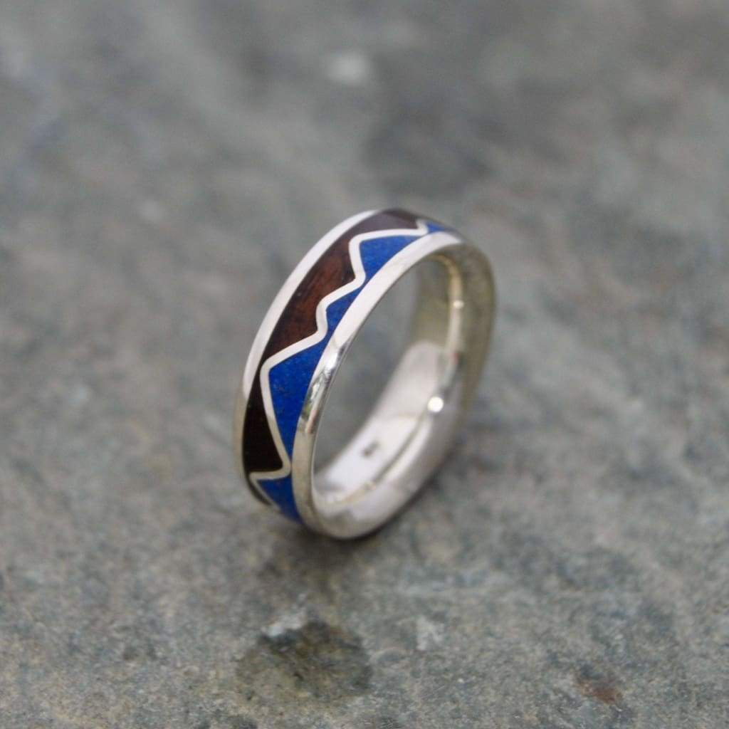 Lapis lazuli mountain ring showing blue stone inlay and walnut grain