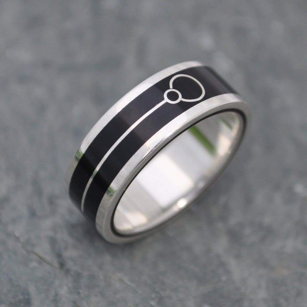 Symbolic commitment ring with black coyol and recycled silver, Union Lados