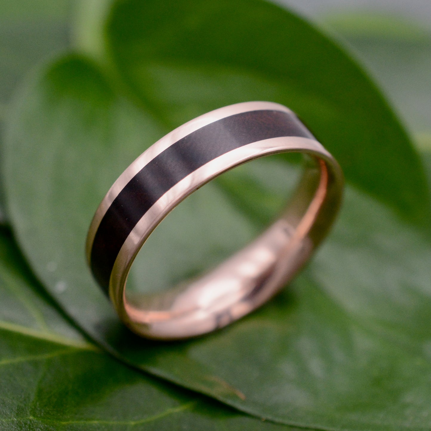 Lados rosewood ring with recycled rose gold edges and wood inlay